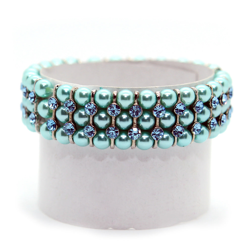 Helios: Turquoise Pearls and Crystals Bracelet. Fashion Jewelry by Nando Medina