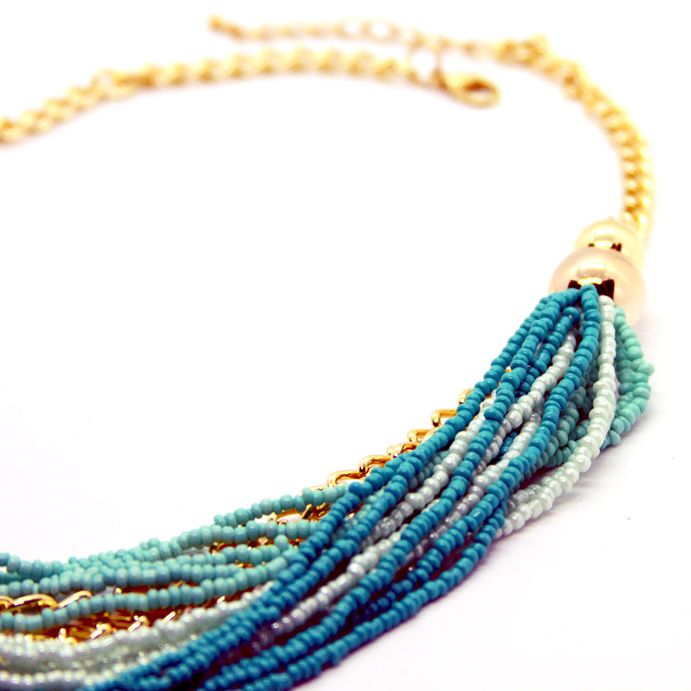 Seducción: Classic Turquoise Cascading Glass-bead Necklace. Fashion Jewelry by Nando Medina