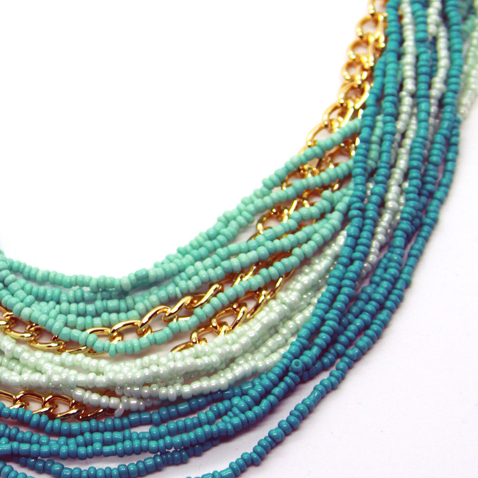 Seducción: Classic Turquoise Cascading Glass-bead Necklace. Fashion Jewelry by Nando Medina