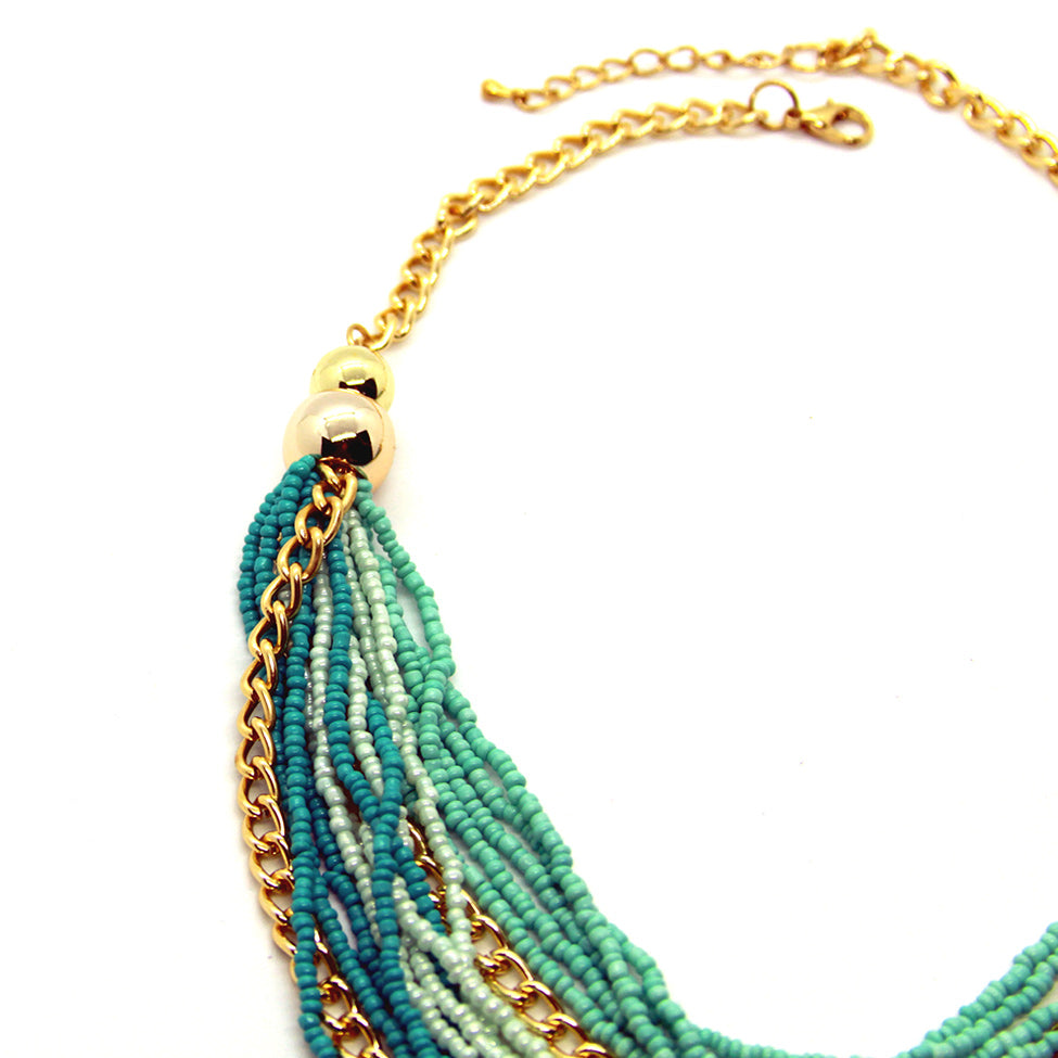 Seducción: Classic Turquoise Cascading Glass-bead Necklace. Fashion Jewelry by Nando Medina