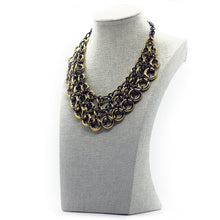 Seducción: Cascading Circle Necklace Set. Fashion Jewelry by Nando Medina