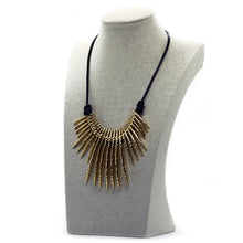 Stylish hammered bar ray necklace, by Nando Medina