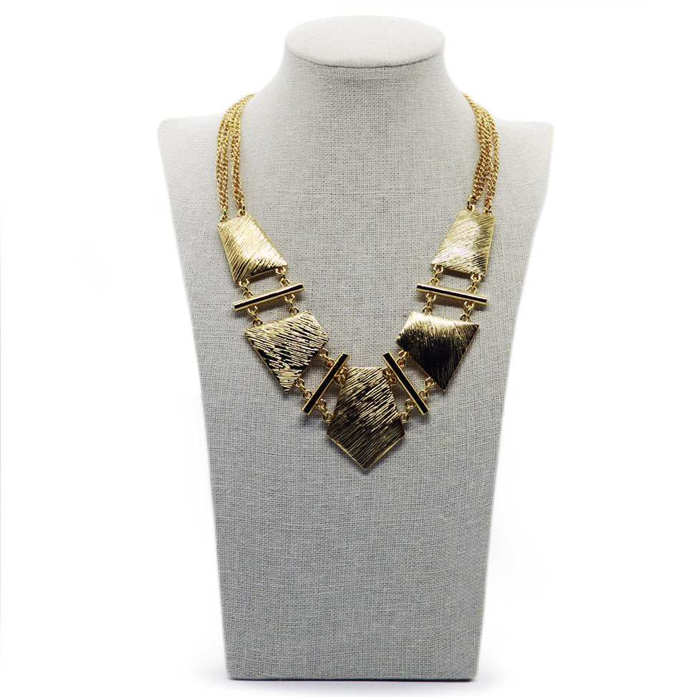 Seducción: Scratched Metal Geo Necklace Set. Fashion Jewelry by Nando Medina