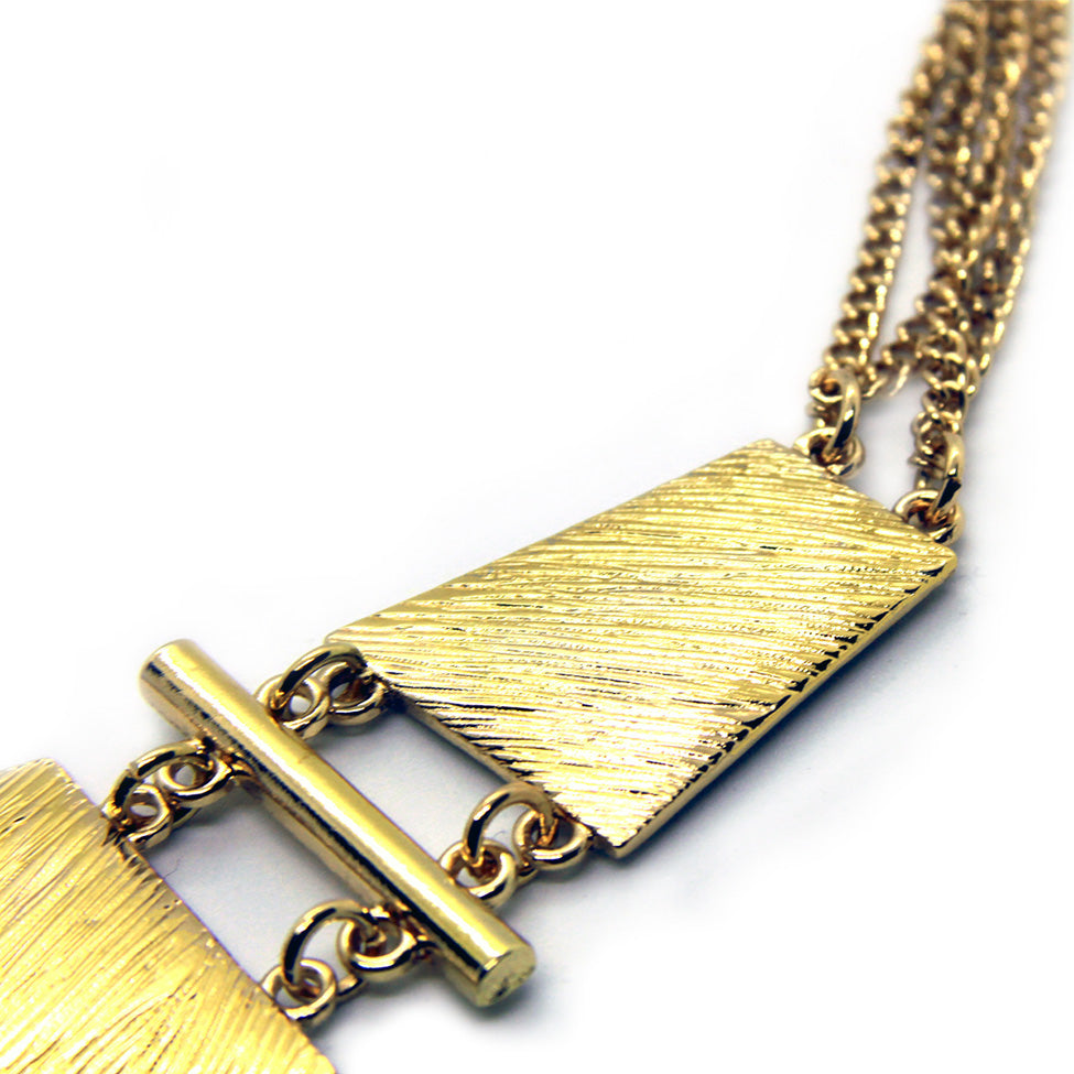 Seducción: Scratched Metal Geo Necklace Set. Fashion Jewelry by Nando Medina